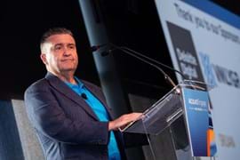 Corporate Event Photography | Melbourne Photography | Close up of business man talking on podium