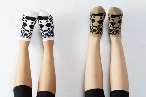 Product Clothing Photography | Melbourne Photography | Close up of two pairs of legs with patterned yoga socks
