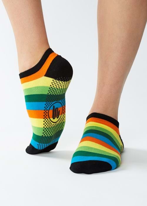 Product Clothing Photography | Melbourne Photography | Close up of woman wearing rainbow yoga socks on white background