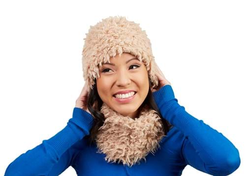 Product Clothing Photography | Melbourne Photography | Close up of woman smiling wearing winter hat and scarf on white backgroun