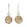Product Jewellery Photography | Melbourne Photography | Close up of gold and silver coin drop earings on white background